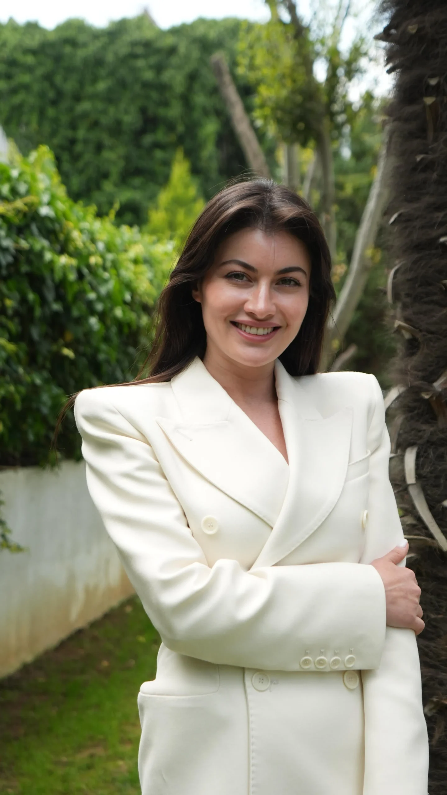 Merve Akkaya standing in a garden